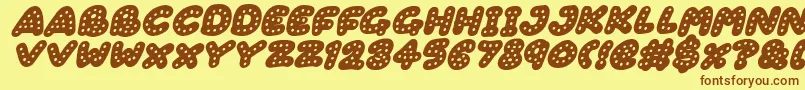 Gingerbread Italic-Schriftart – Braune Schriften auf gelbem Hintergrund