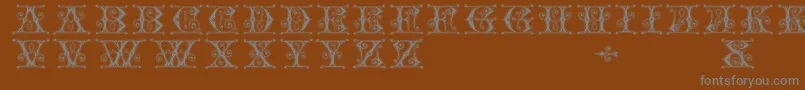 Gingerbread-Schriftart – Graue Schriften auf braunem Hintergrund