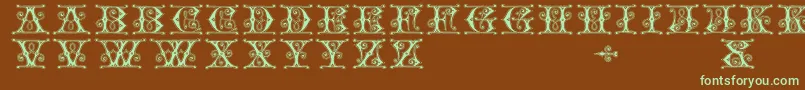 フォントGingerbread – 緑色の文字が茶色の背景にあります。