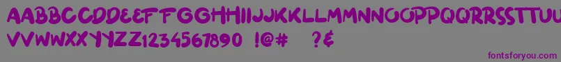 ginuks-Schriftart – Violette Schriften auf grauem Hintergrund