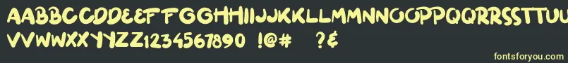 ginuks Font – Yellow Fonts on Black Background