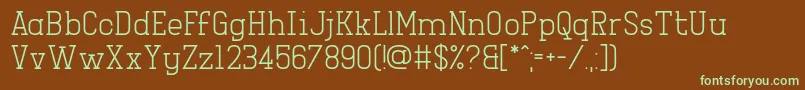 Girlesque-fontti – vihreät fontit ruskealla taustalla