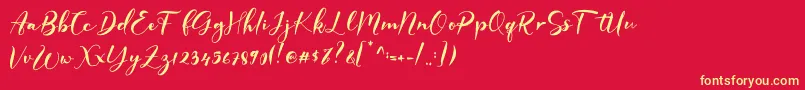 フォントGISELLE – 黄色の文字、赤い背景