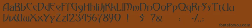 フォントgismonda – 黒い文字が茶色の背景にあります