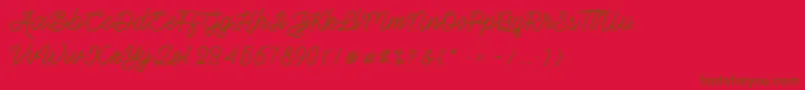 Gittelsy Font – Brown Fonts on Red Background