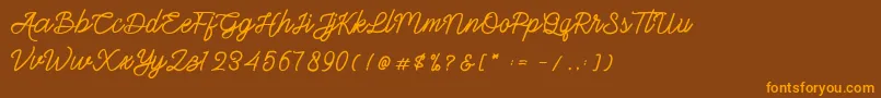 Gittelsy-Schriftart – Orangefarbene Schriften auf braunem Hintergrund