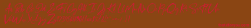 Giugliamore Font Font – Red Fonts on Brown Background