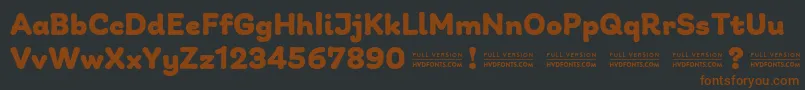 GiuliaPlainDEMO Bold-Schriftart – Braune Schriften auf schwarzem Hintergrund