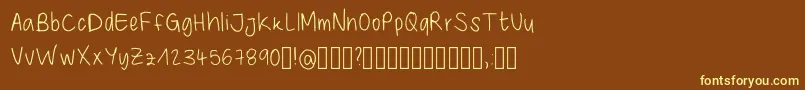 GiulysHandwriting Regular Font – Yellow Fonts on Brown Background