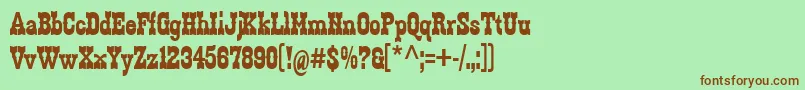 Zabars-fontti – ruskeat fontit vihreällä taustalla