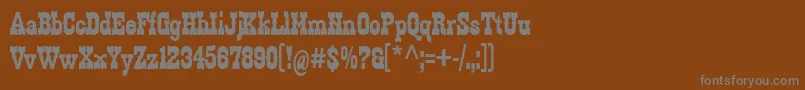 Zabars-fontti – harmaat kirjasimet ruskealla taustalla