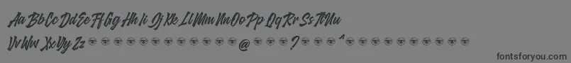 glarious-Schriftart – Schwarze Schriften auf grauem Hintergrund