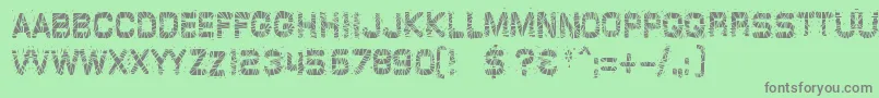 glazkrak Font – Gray Fonts on Green Background