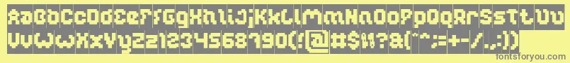 Czcionka GLITCH Inverse – szare czcionki na żółtym tle