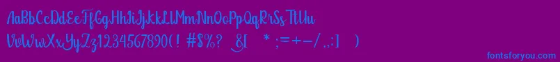 Glitter Free Font – Blue Fonts on Purple Background