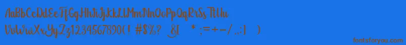 Glitter Free Font – Brown Fonts on Blue Background