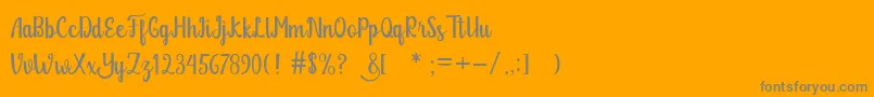 Glitter Free Font – Gray Fonts on Orange Background