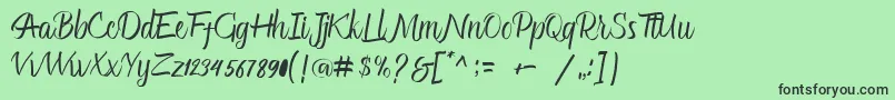 フォントGlitter Script – 緑の背景に黒い文字