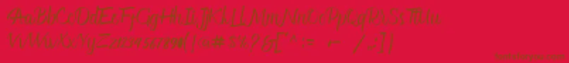 Fonte Glitter Script – fontes marrons em um fundo vermelho