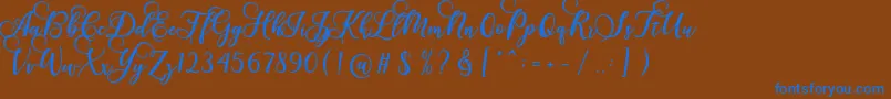 Gloretha Script-Schriftart – Blaue Schriften auf braunem Hintergrund