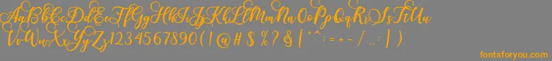 fuente Gloretha Script – Fuentes Naranjas Sobre Fondo Gris