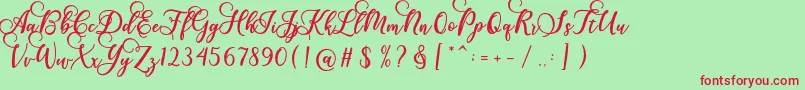 Gloretha Script-Schriftart – Rote Schriften auf grünem Hintergrund