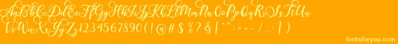 Gloretha Script Font – Yellow Fonts on Orange Background