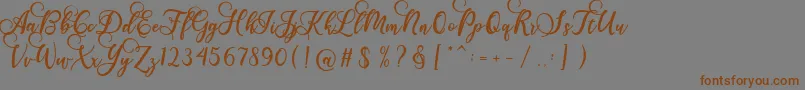 Gloretha Script Font – Brown Fonts on Gray Background