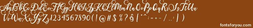 フォントGloretha Script – 茶色の背景に白い文字