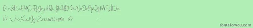 Glorial Font – Gray Fonts on Green Background