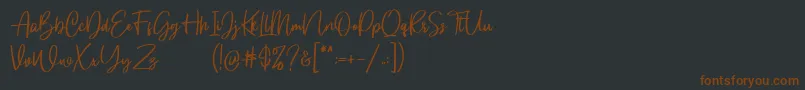 Gloryouss Demo-Schriftart – Braune Schriften auf schwarzem Hintergrund