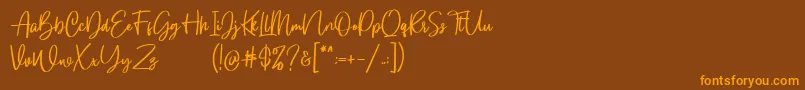 Gloryouss Demo Font – Orange Fonts on Brown Background