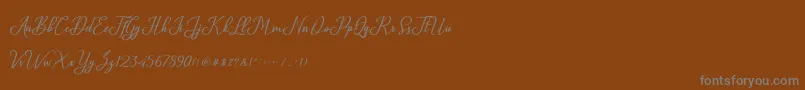 Glossy-Schriftart – Graue Schriften auf braunem Hintergrund