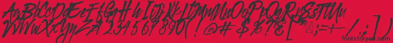 Fonte Gloucester BrushScriptDEMO – fontes pretas em um fundo vermelho