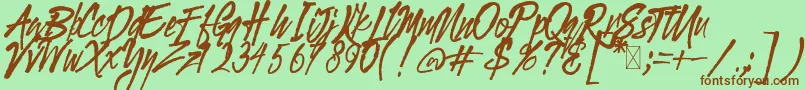 Fonte Gloucester BrushScriptDEMO – fontes marrons em um fundo verde