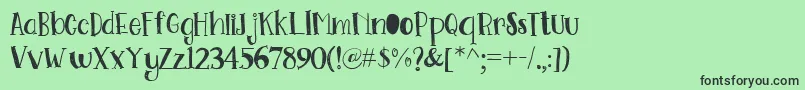Go Doodling Font Font – Black Fonts on Green Background