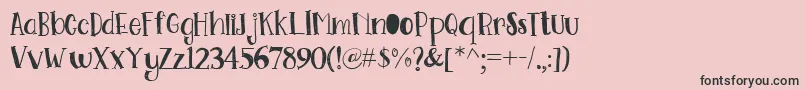 Go Doodling Font Font – Black Fonts on Pink Background