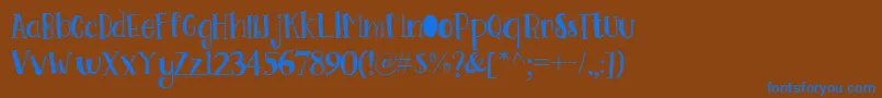 Шрифт Go Doodling Font – синие шрифты на коричневом фоне