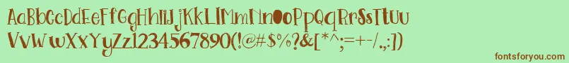 Go Doodling Font Font – Brown Fonts on Green Background