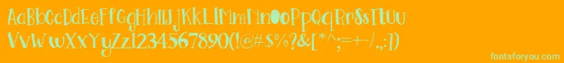 Go Doodling Font Font – Green Fonts on Orange Background