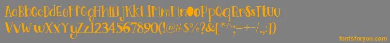Go Doodling Font Font – Orange Fonts on Gray Background