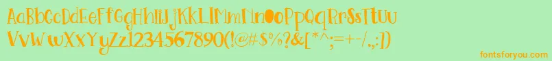 Go Doodling Font Font – Orange Fonts on Green Background