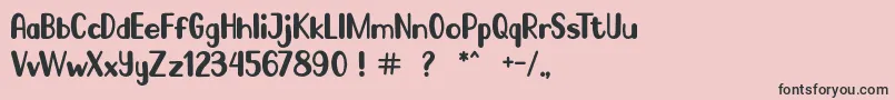 フォントGo Frog – ピンクの背景に黒い文字