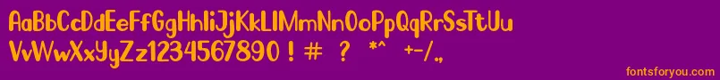 Go Frog-Schriftart – Orangefarbene Schriften auf violettem Hintergrund