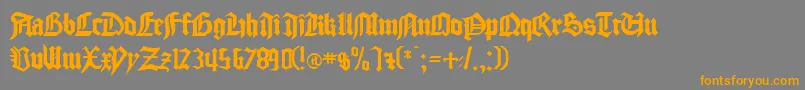 フォントgocmp    – オレンジの文字は灰色の背景にあります。