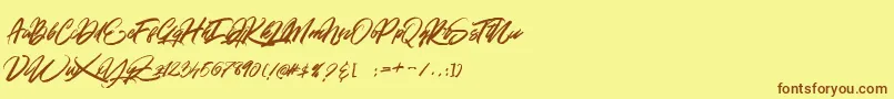 GOLD BRUSH Font – Brown Fonts on Yellow Background