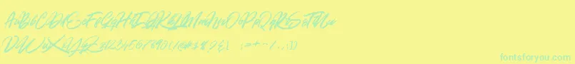 GOLD BRUSH-Schriftart – Grüne Schriften auf gelbem Hintergrund