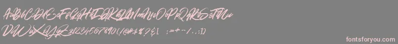 フォントGOLD BRUSH – 灰色の背景にピンクのフォント