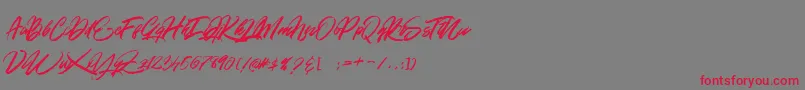 フォントGOLD BRUSH – 赤い文字の灰色の背景