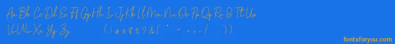 Fonte Golden Bridge Script – fontes laranjas em um fundo azul